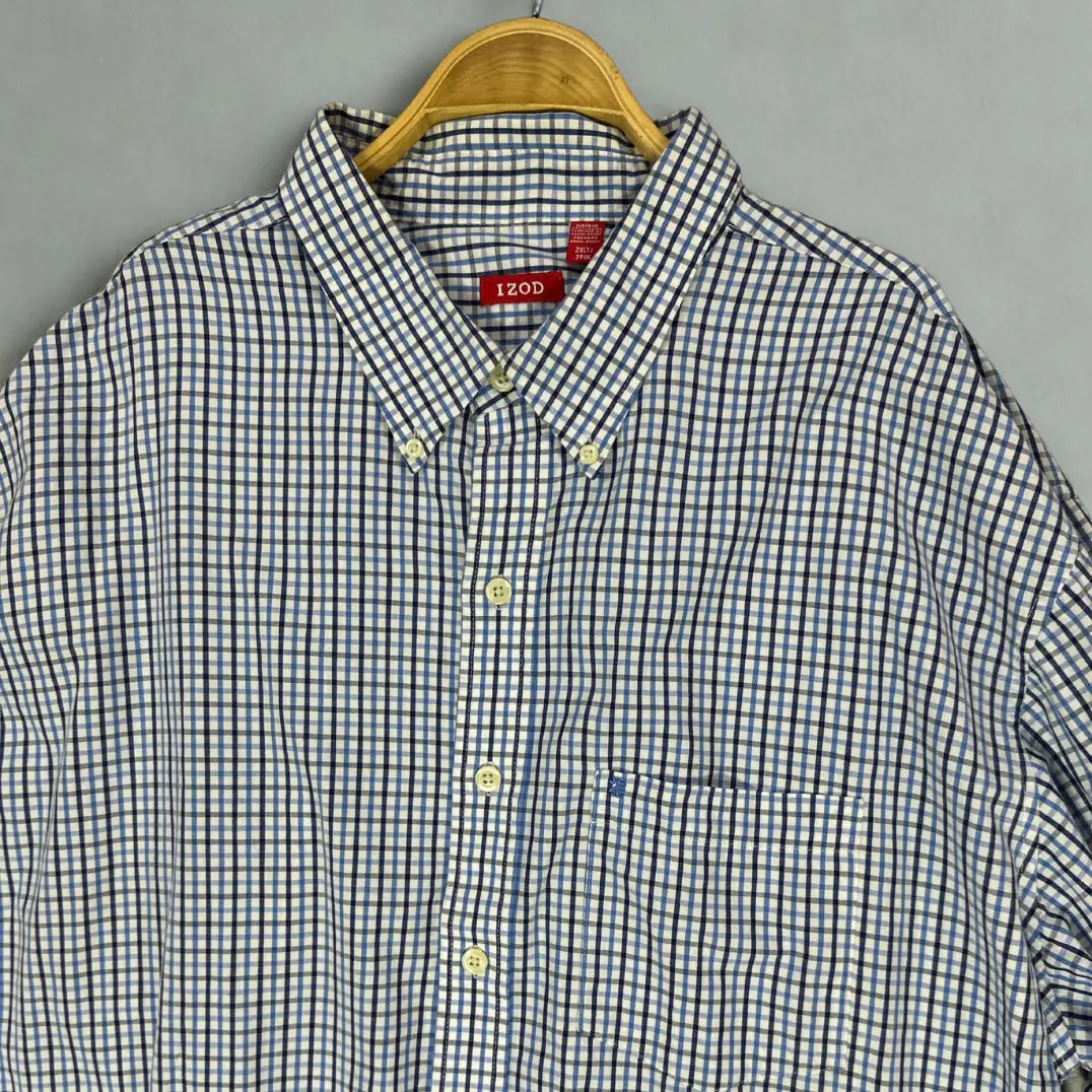 IZOD ®. It features a timeless and sharp graph check pattern, combining shades of blue and black on a crisp white background.
