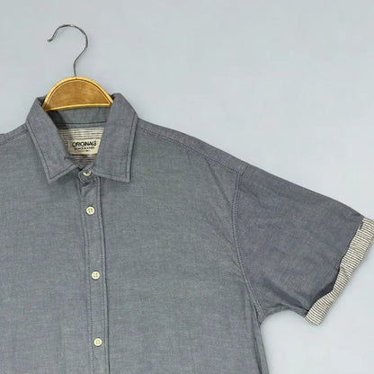 "Originals by Jack & Jones line ®. It is crafted from a versatile grey chambray or end-on-end fabric.