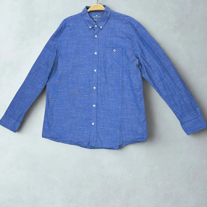 Tom Tailor ®. It features a beautiful blue