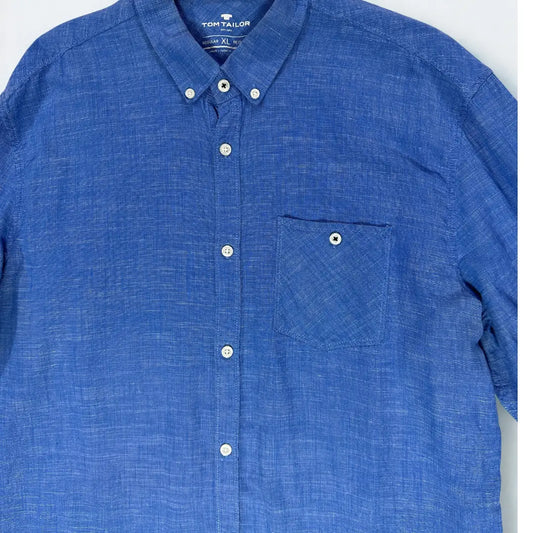 Tom Tailor ®. It features a beautiful blue