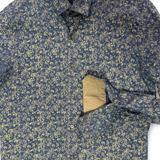 PASSERO ®. It features a dark, moody base color (charcoal) overlaid with a striking gold or khaki