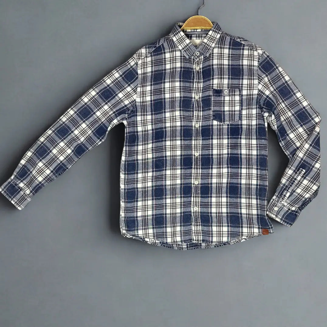 Tom Tailor.® It features a timeless plaid pattern in a versatile color