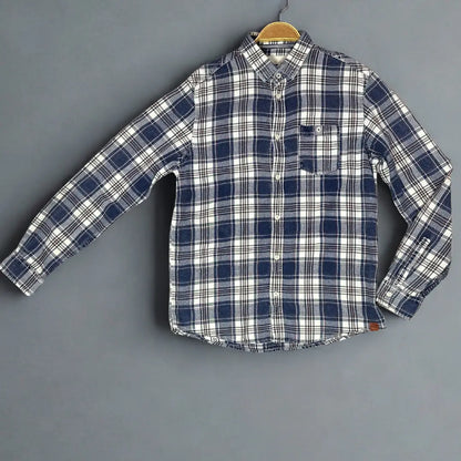 Tom Tailor.® It features a timeless plaid pattern in a versatile color