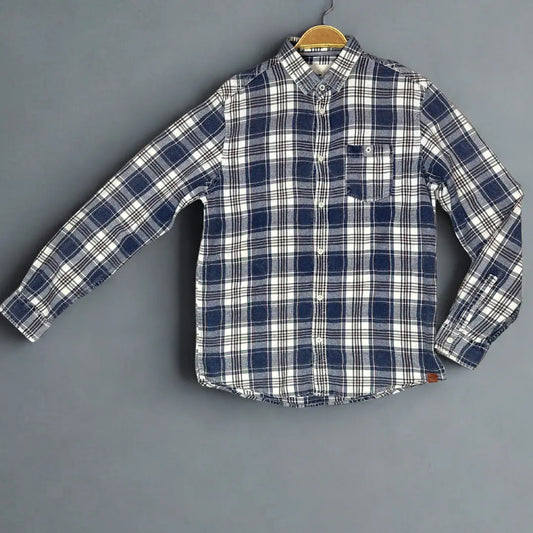 Tom Tailor.® It features a timeless plaid pattern in a versatile color