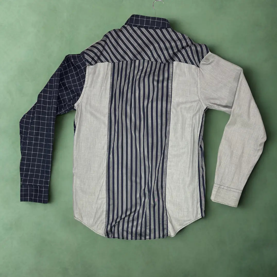 Zara ® It features a bold, deconstructed patchwork design