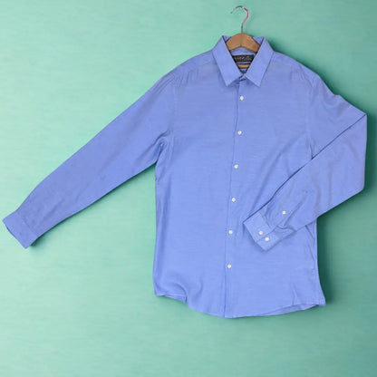 Primark ® It comes in a handsome solid light blue and is crafted from a textured fabric