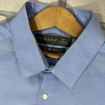 Primark ® It comes in a handsome solid light blue and is crafted from a textured fabric