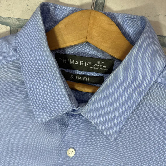 Primark ® It comes in a handsome solid light blue and is crafted from a textured fabric