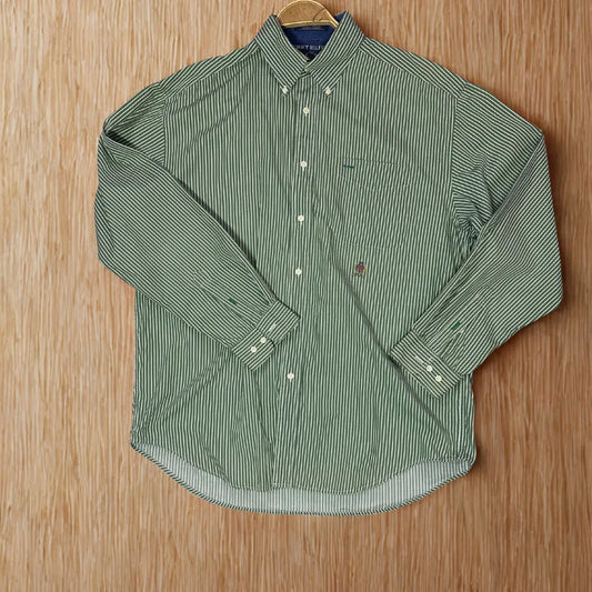 Tommy Hilfiger® Showcasing the brand's signature preppy, all-American style.