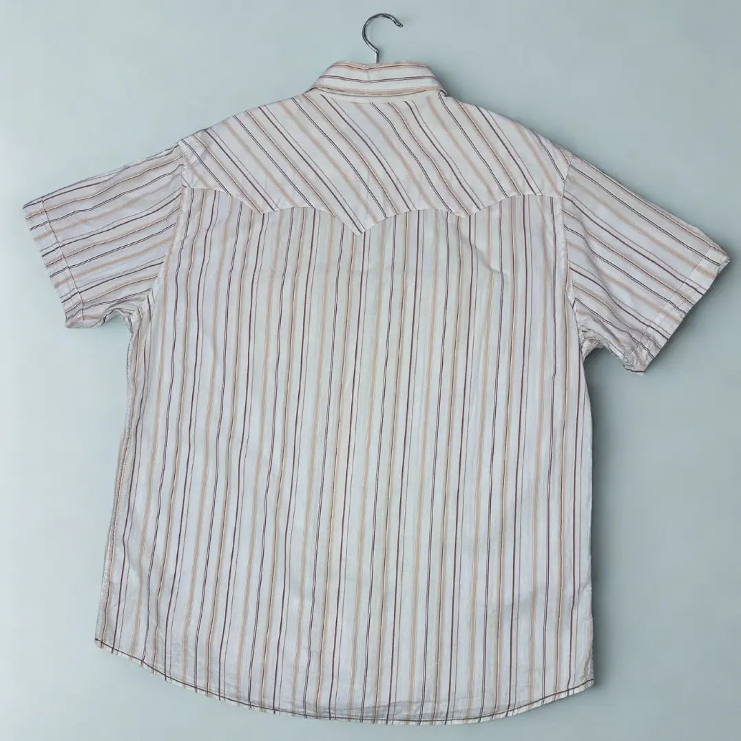 The Heroic Corp ®It features a modern take on the classic Western-style shirt.