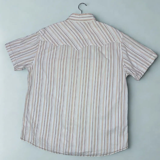 The Heroic Corp ®It features a modern take on the classic Western-style shirt.