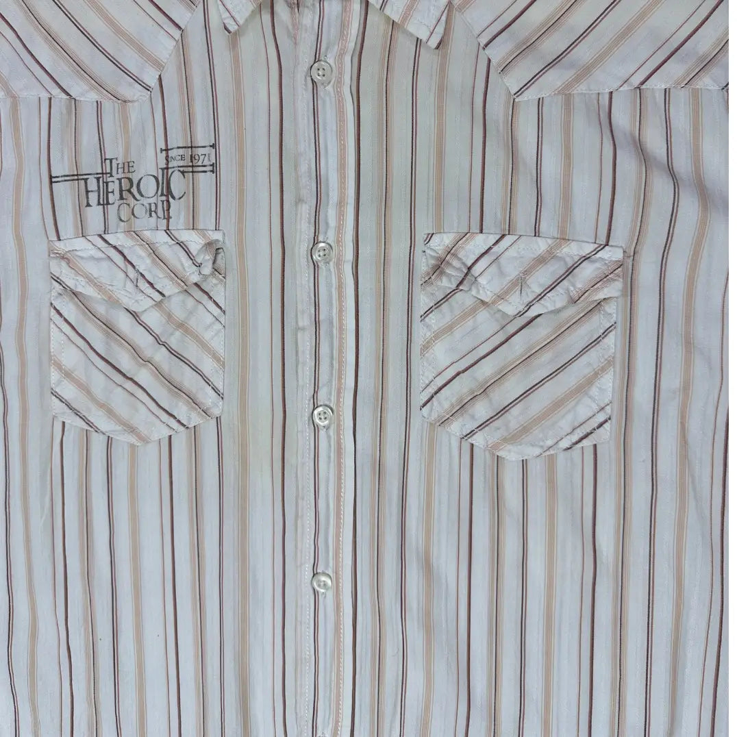 The Heroic Corp ®It features a modern take on the classic Western-style shirt.